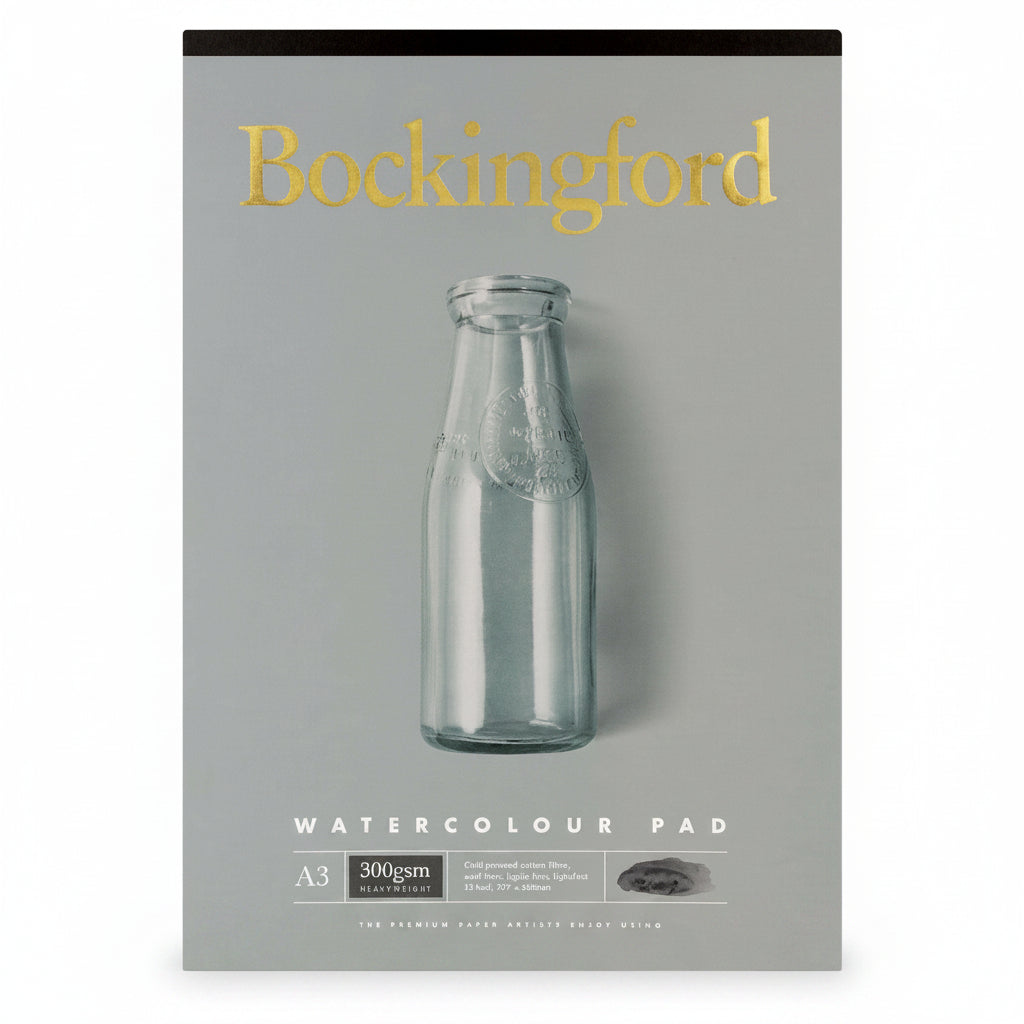 Bockingford watercolor pad with a glass bottle on a gray background
