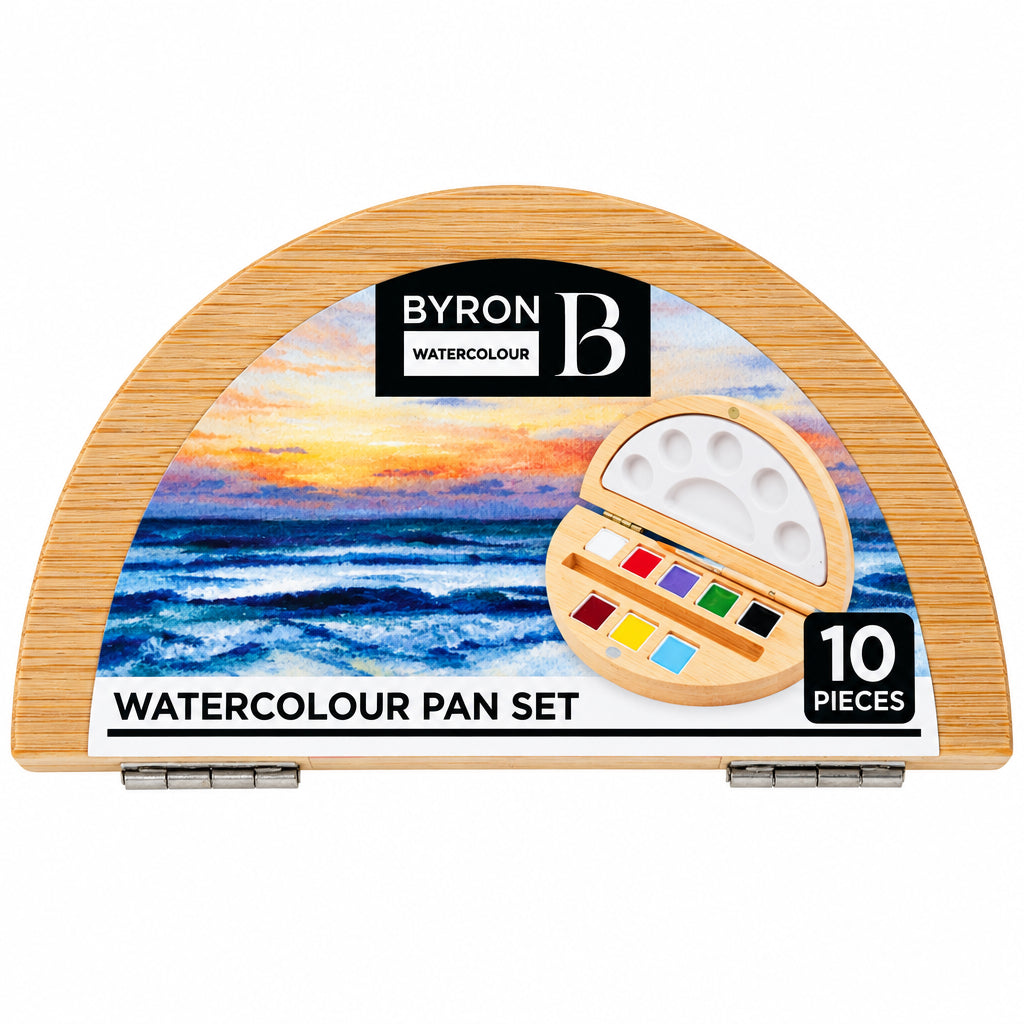 Byron Watercolour Pan Set in a wooden semi-circular case with a scenic landscape label, showing 10 watercolor pans inside, on a white background.