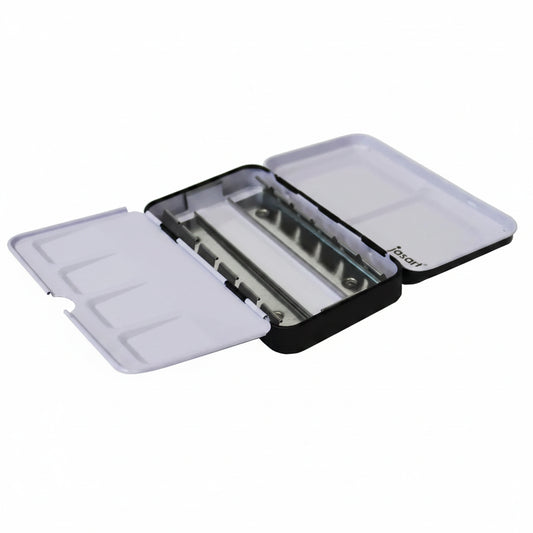 An open black and white paint tin palette case with multiple compartments, shown on a plain white background.