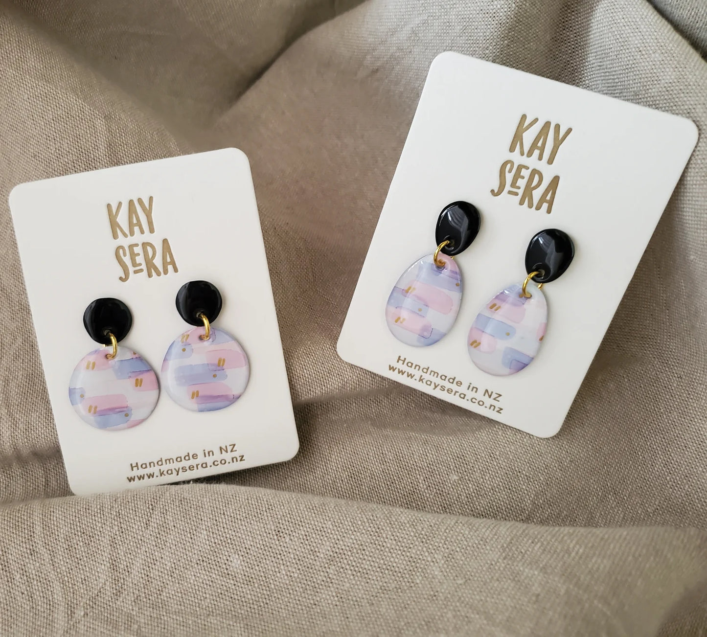 Hand-painted paper ear
rings vibrant floral design Palmerston North Kay Sera