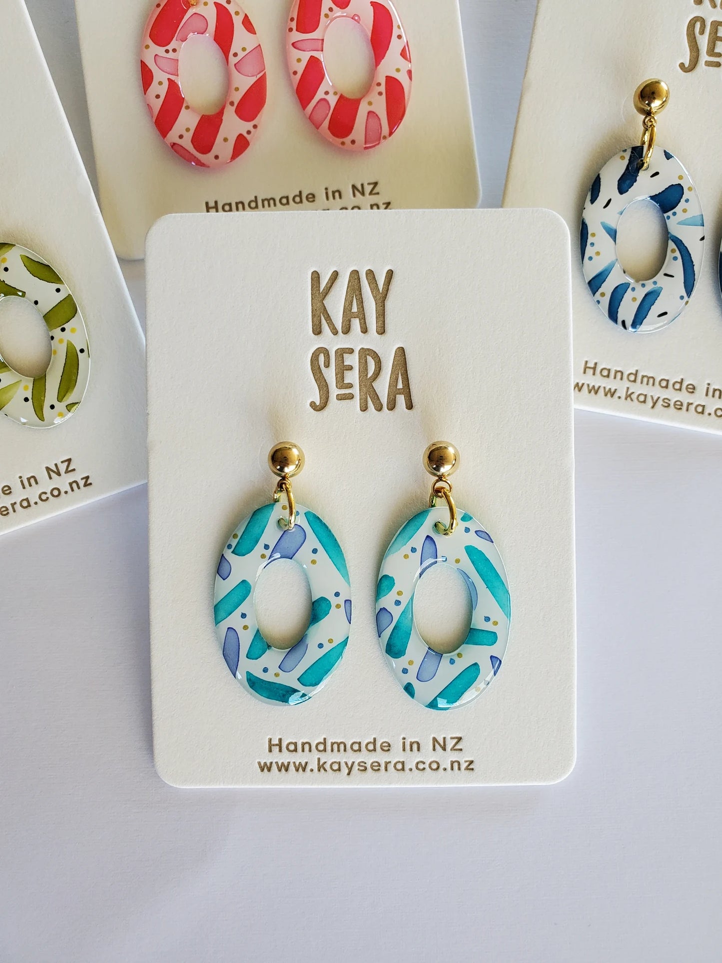 Hand-painted paper earrings vibrant design Palmerston North Kay Sera