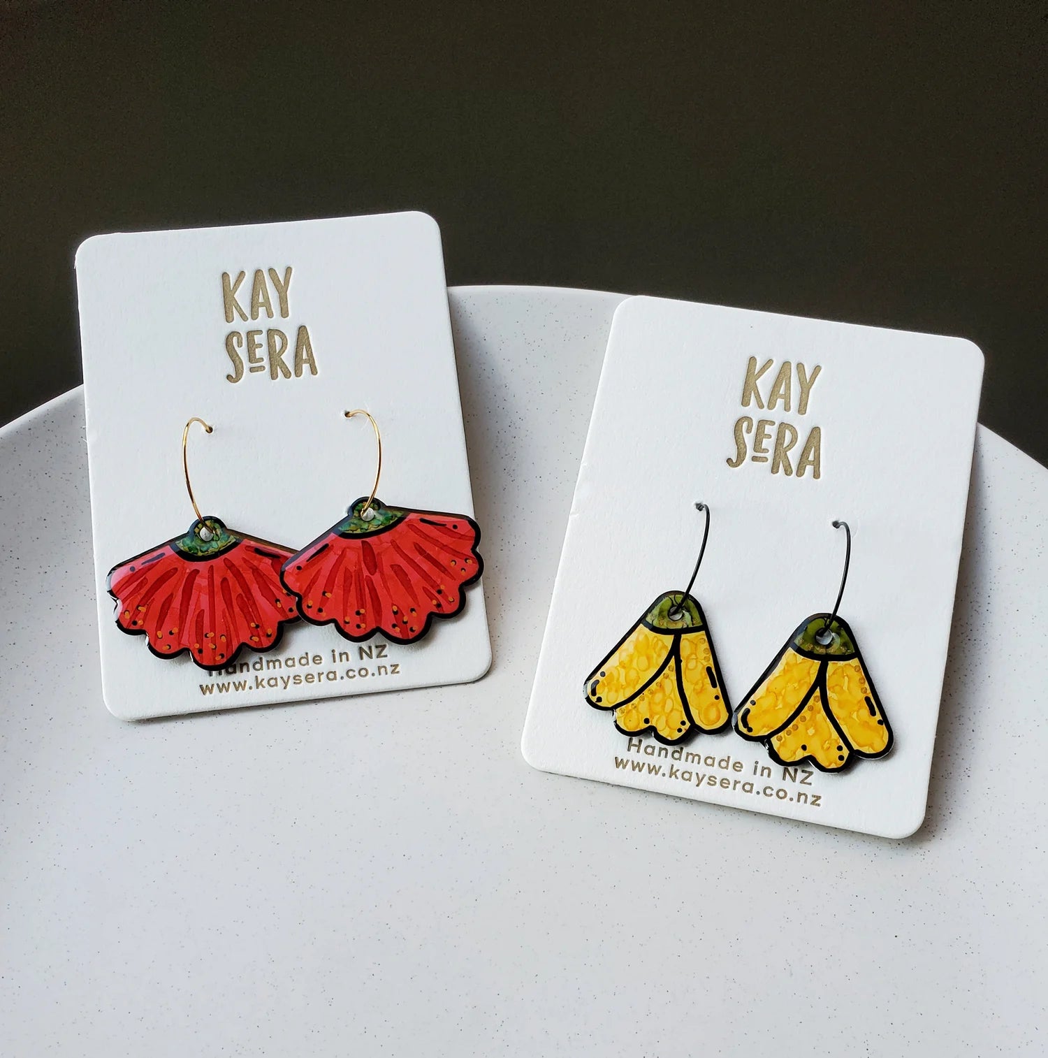 Hand-painted paper earrings vibrant design Palmerston North Kay Sera