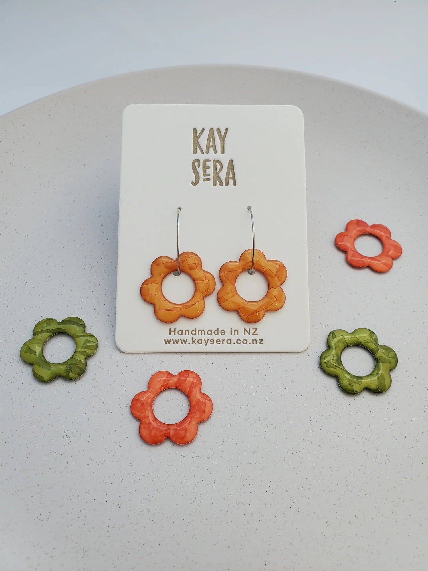 Hand-painted paper earrings vibrant design Palmerston North Kay Sera