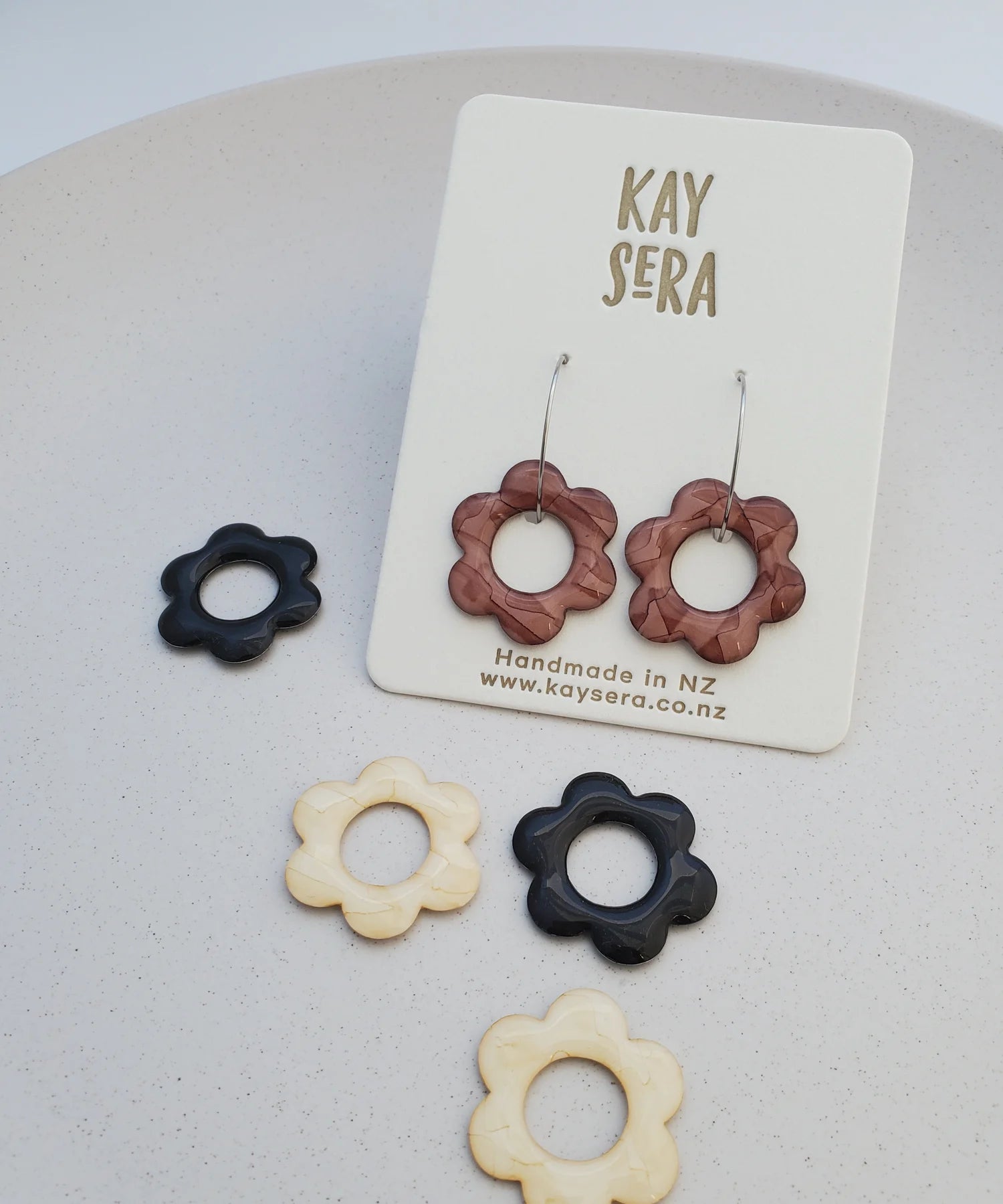 Hand-painted paper earrings vibrant design Palmerston North Kay Sera