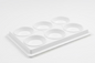 White plastic paint palette with six circular cavities