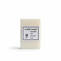 Bar of lavender goats milk soap with a label on a white background