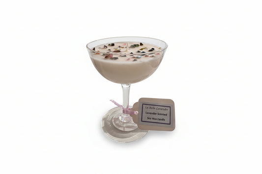Decorative candle with a label on a white surface