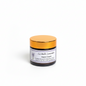 Hand cream jar with gold lid on a white background